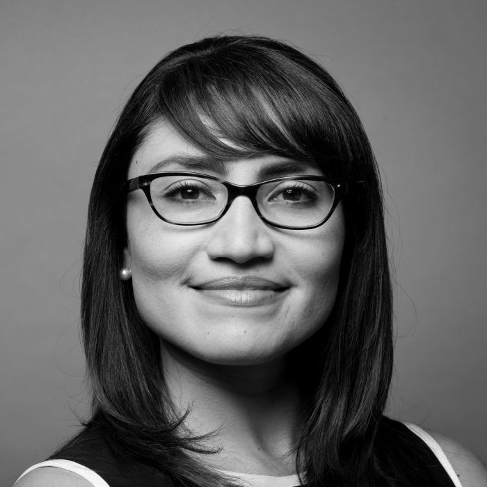 Professional black-and-white headshot of Dr. Gema Kloppe-Santamaria
