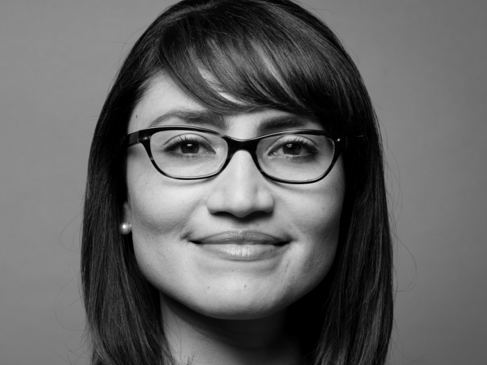 Professional black-and-white headshot of Dr. Gema Kloppe-Santamaria